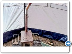 Inside Tent With Wood Stove